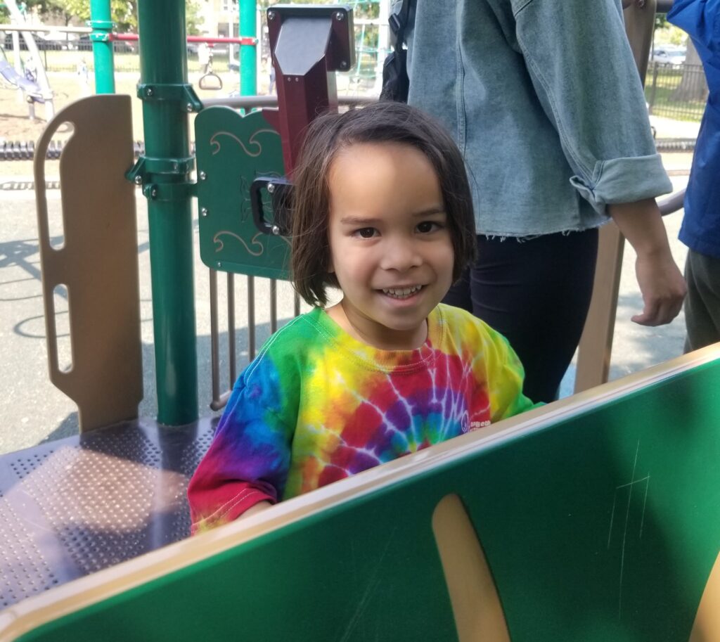 Fun on the playground at Families Together Summer Camp.